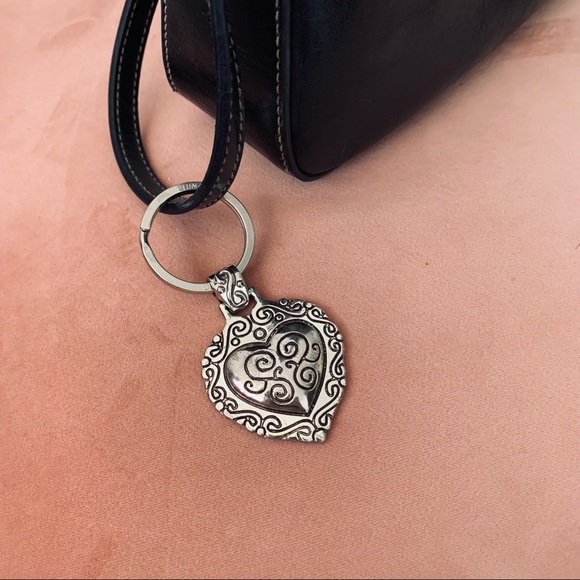 Beautiful black leather bag with elegant charm - Picture 4 of 5